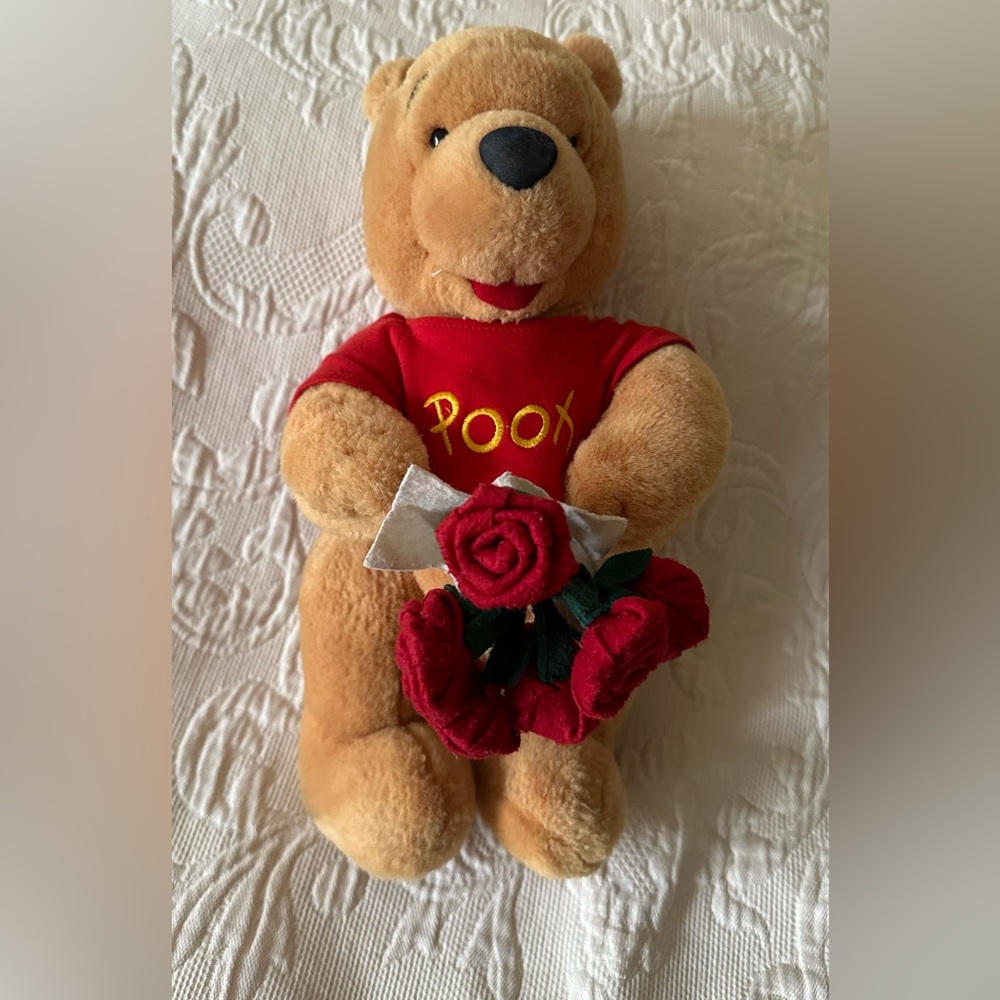 Rare Winnie the Pooh Carrying Roses